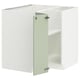 White METOD kitchen cabinet set with green door, hinged.