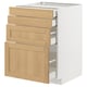 White METOD kitchen unit with oak drawers and door.