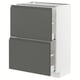 A modern kitchen unit, METOD, with dark grey voxtorp drawers and a white base. It has a sleek, rectangular design with integrated handles.
