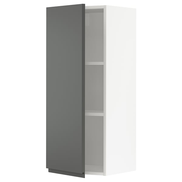 Modern dark grey kitchen cabinet with one adjustable shelf.