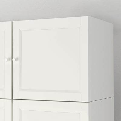 White cabinet with sleek doors, showing quality craftsmanship, clean lines, and minimalistic design.