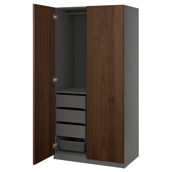 Open wardrobe named PAX, dark wood, metal, rectangular, with shelves and drawers.