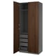 An open PAX wardrobe in dark brown, featuring shelves and drawers.