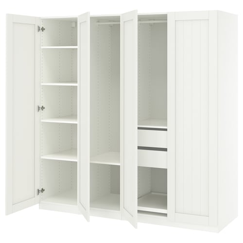 White PAX wardrobe with multiple open shelves and compartments.