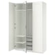 White PAX wardrobe, open doors revealing shelves and mesh baskets, framed mirrors.