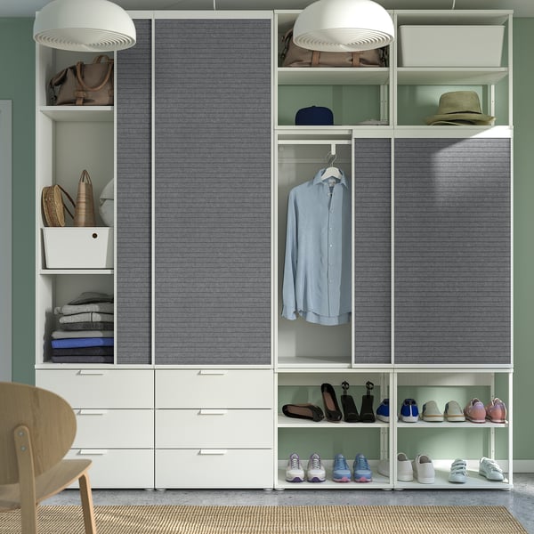 Modern wardrobe with sliding doors, shelves, drawers, and hanging space for efficient clothing and accessory storage.