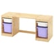 Wooden l-shaped desk, light natural colour. Two storage bins, one on each side. Light purple bins sit inside the desk. Simple, practical design.