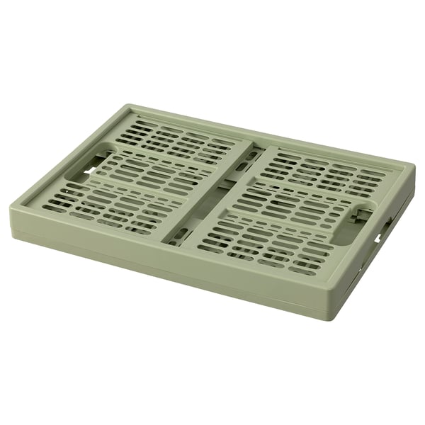 A VEDKLYV folding box in green, made of polypropylene plastic. Its rectangular with vented sides for airflow.