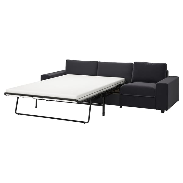A black VIMLE sectional sofa-bed with a sleek modern design, featuring a convertible section for sleeping.