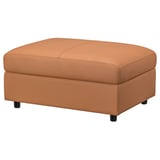 Orange VIMLE footstool with storage, black legs.