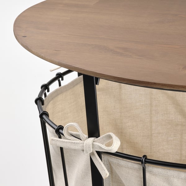 Wooden tabletop with metal frame and cloth pouch.