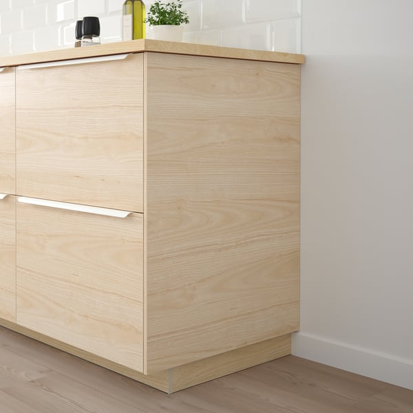 Asher cabinets: melamine-resistant, wood-textured panels, compact, practical.