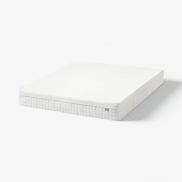 White ÅVABERG mattress, rectangular, foam construction, white fabric cover, handles on sides.