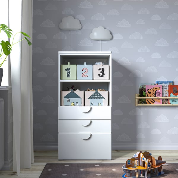 Kids room with cloud theme, storage unit, lights, bookshelf, toy aeroplane. This version captures the essence while staying under the character limit.
