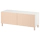 Modern white BESTÅ tv bench with light birch panels and legs, featuring cable management and adjustable shelves.