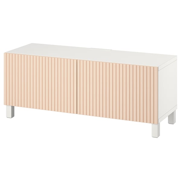 Modern white tv bench with light wooden fluted doors, four metal legs, and adjustable shelves.