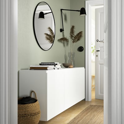 White BESTÅ wall-mounted cabinet, airy with adjustable shelves.