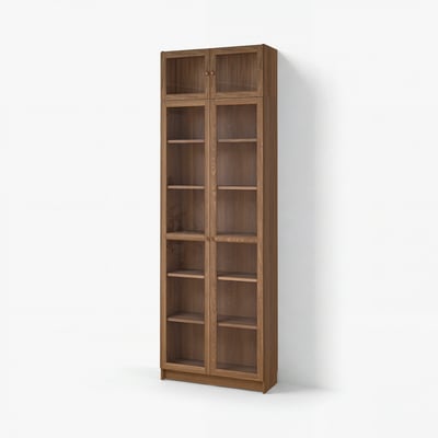 A tall wooden BILLY bookcase with glass doors, displayed against a white wall.