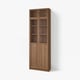 An IKEA BILLY bookcase in brown, featuring closed wooden doors with adjustable shelves inside.