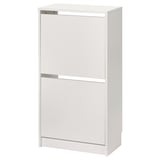 A white BISSA shoe cabinet. This functional piece has two sections for organised storage, with a sleek design suitable for hallways.