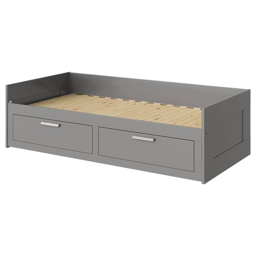 A BRIMNES grey day-bed with two drawers, suitable for small spaces, featuring a wooden slatted base and made from particleboard and pine.
