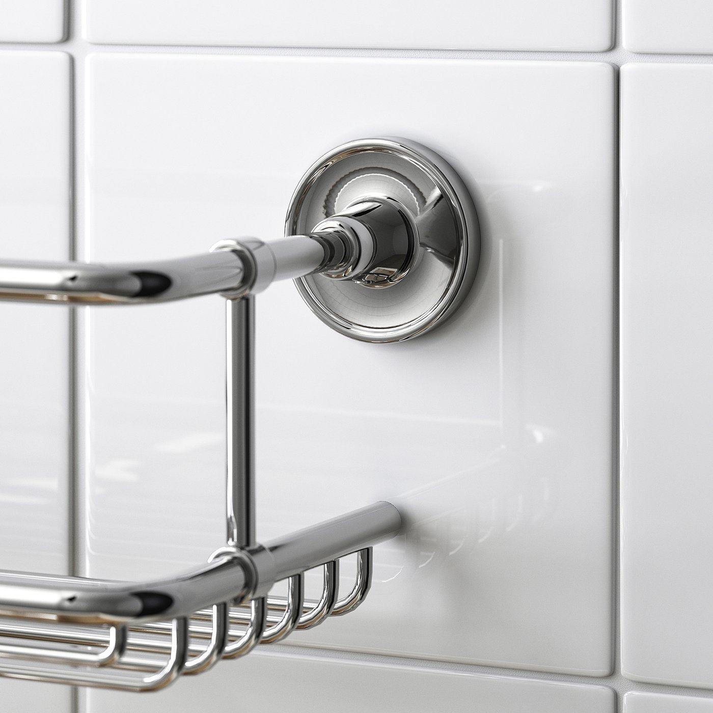 Chrome wall-mounted shower shelf with hooks on pristine tiles.