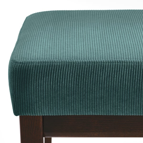Teal corduroy-topped bench, sturdy wooden legs. Eco-friendly, comfy seating.
