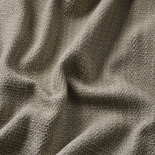 Close-up of fabric with textured, irregular yarns; soft and supportive.