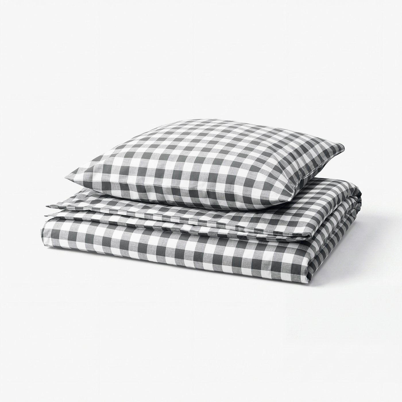 Folded grey and white chequered duvet cover set with zippers, made of 100% organic cotton.