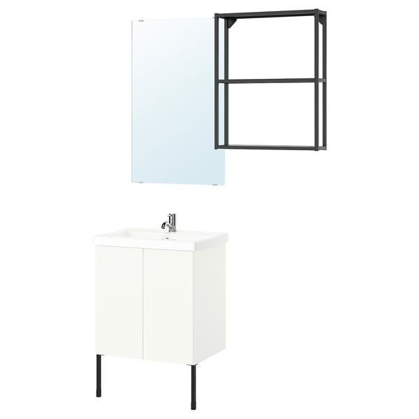 Modern bathroom setup with white cabinet, sleek sink, and mirror; industrial-style metal accents.