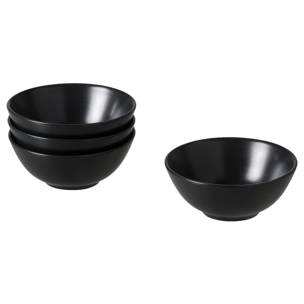 Stack of four FÄRGKLAR black stoneware bowls with simple design.
