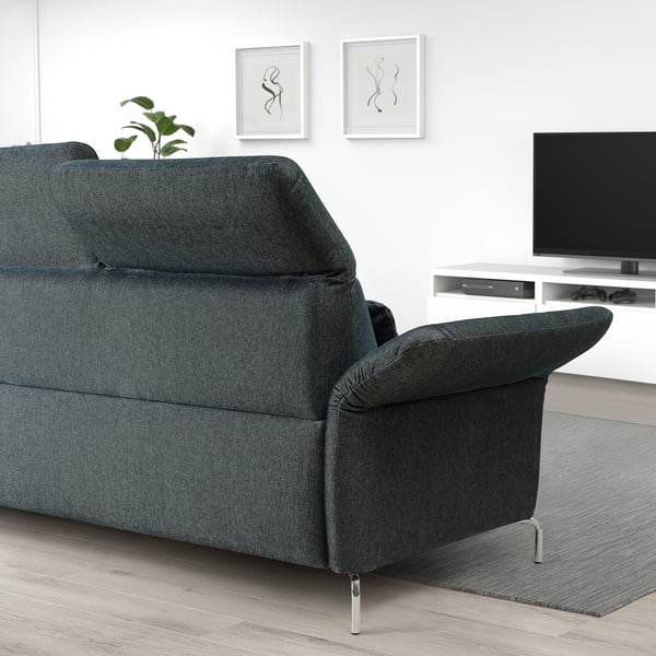 Modern dark grey FAMMARP sofa, sleek and stylish, fits neatly in contemporary living room with minimalistic decor.