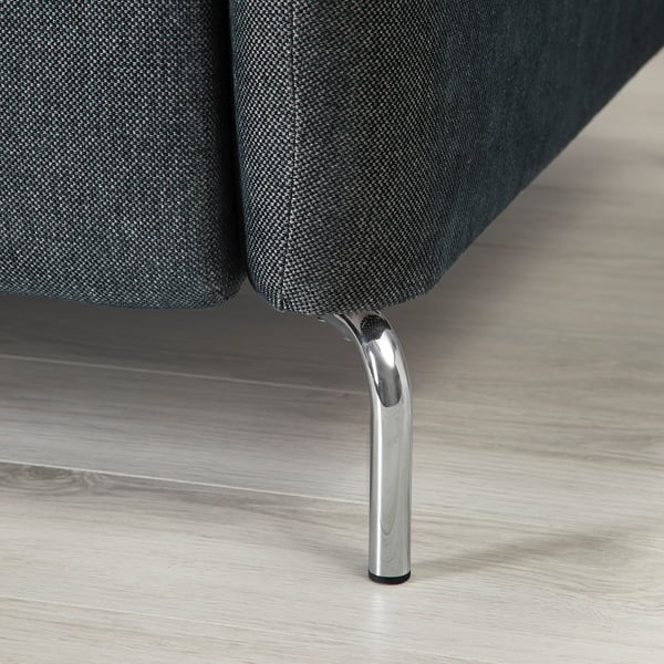 Modern sofa with adjustable. Dark fabric, chrome legs, plush cushions. High-quality design for comfort and style.