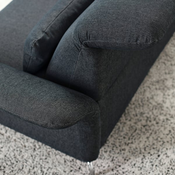 Close-up of a dark blue FAMMARP sofa, showing plush cushions and quality fabric.