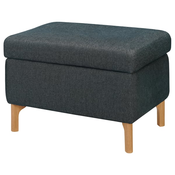 The FAMMARP footstool in dark blue tweed fabric with wooden legs offers storage and comfort.