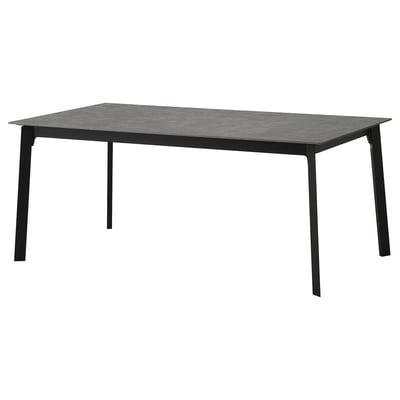 Extendable dining table, sleek design, al. Legs, stone top, seats 6-8.