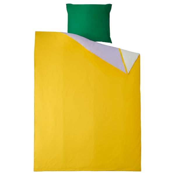 Bright yellow bed cover with colourful triangle design, green pillow, 100% cotton.