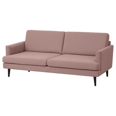 A GRILLSTORP pink fabric sofa with sleek legs, providing a clean and inviting design for comfort.