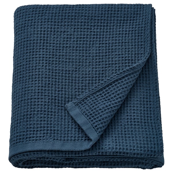 IKEAs blue GULLDYNA recycled cotton towel, folded, waffle texture, light colour.