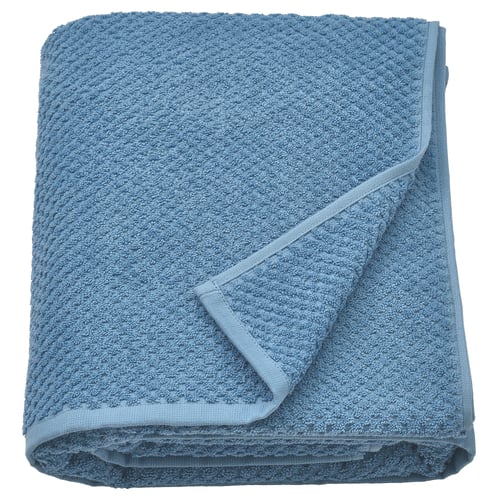 A folded light blue GULVIAL towel, soft and fluffy, made of 100% cotton, neatly folded with a smooth edge design.