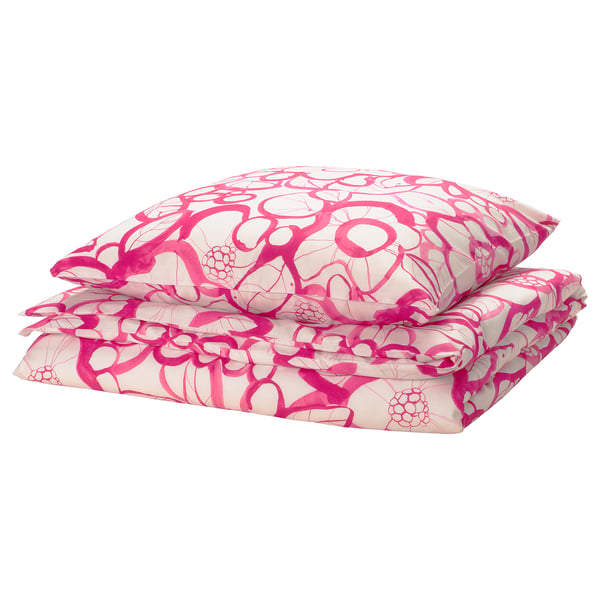 Bright pink bedding set with floral patterns, rectangular shape, soft cotton/lyocell blend.