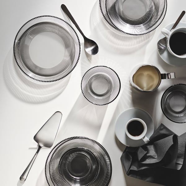 Grey HAVSGÄDDA glassware set, round, modern radial design, stackable, durable.