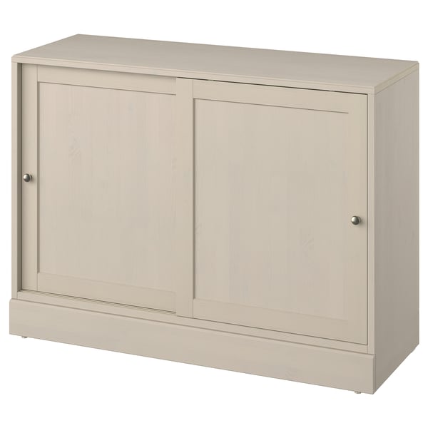 A HAVSTA light beige wooden cabinet, featuring sliding doors and a sleek scandinavian design.