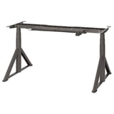 A black IDÅSEN adjustable desk base in triangular shape with extendable height.