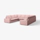 Pink KIVIK sectional sofa, modern minimalist design, with plush cushions and low armrests.