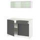 Modern white kitchen unit with gray doors and marble countertop. Includes wall cabinet with sliding glass doors.