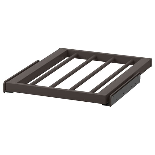 A grey KOMPLEMENT trouser hanger with a semi-matte finish, designed to organise pants efficiently.