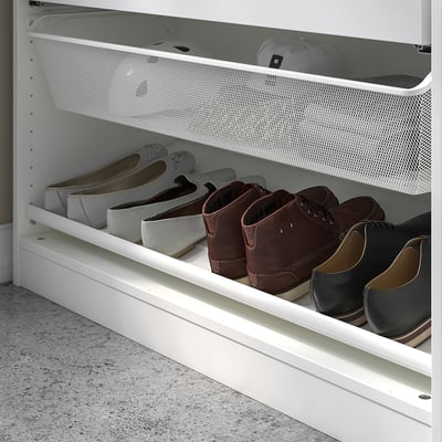 White shoe rack, three tiers, holds various shoes, made of steel.