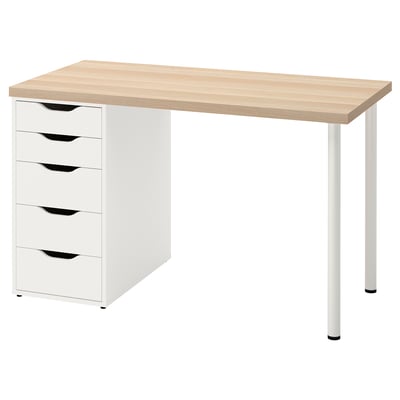 An ikea LAGKAPTEN desk with a light wood top and white storage unit featuring five drawers. The desk has a sleek, minimalist design with metal legs.