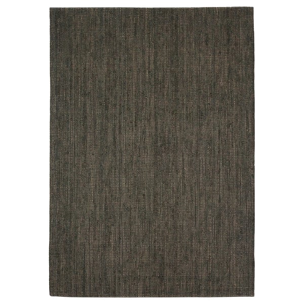 A dark green rectangular LANDBANA rug made of natural jute, suitable for various settings.